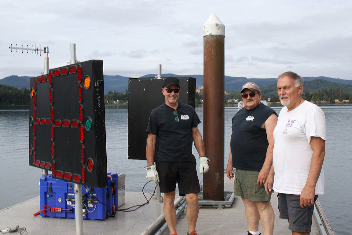 The Head Hunter Top Eliminator team getting the clocks ready for the race.